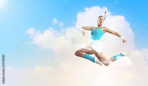 Fototapeta Naklejka Na Ścianę i Meble -  Image of sport woman jumping