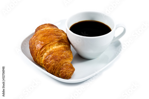 breakfast with cup of black coffee and croissant