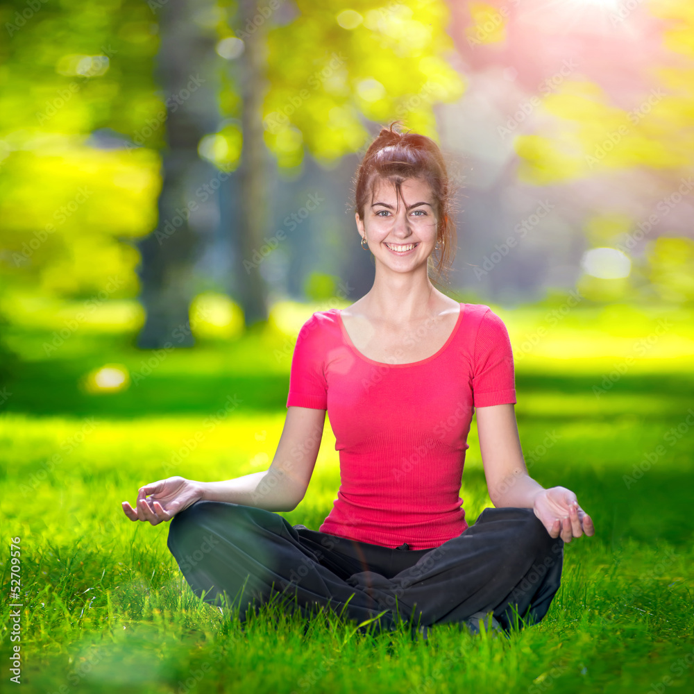 Young woman doing yoga exercises Young woman doing yoga exercises