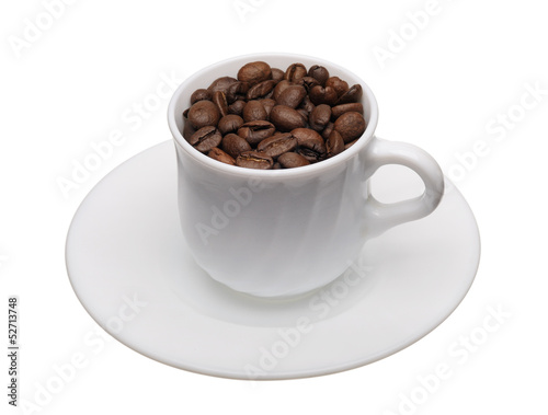 White cup with coffee grains
