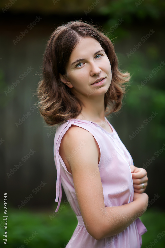 Naklejka premium Young beautiful caucasian woman takes rest in park