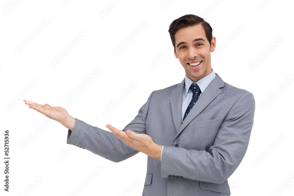 Happy young businessman giving a presentation with his hands Happy young businessman giving a presentation with his hands