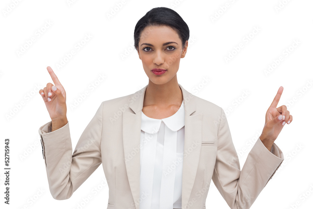 Serious businesswoman with hands up Serious businesswoman with hands up