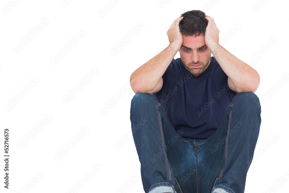 Sad man sitting on the floor while holding his head Stock Illustration ...