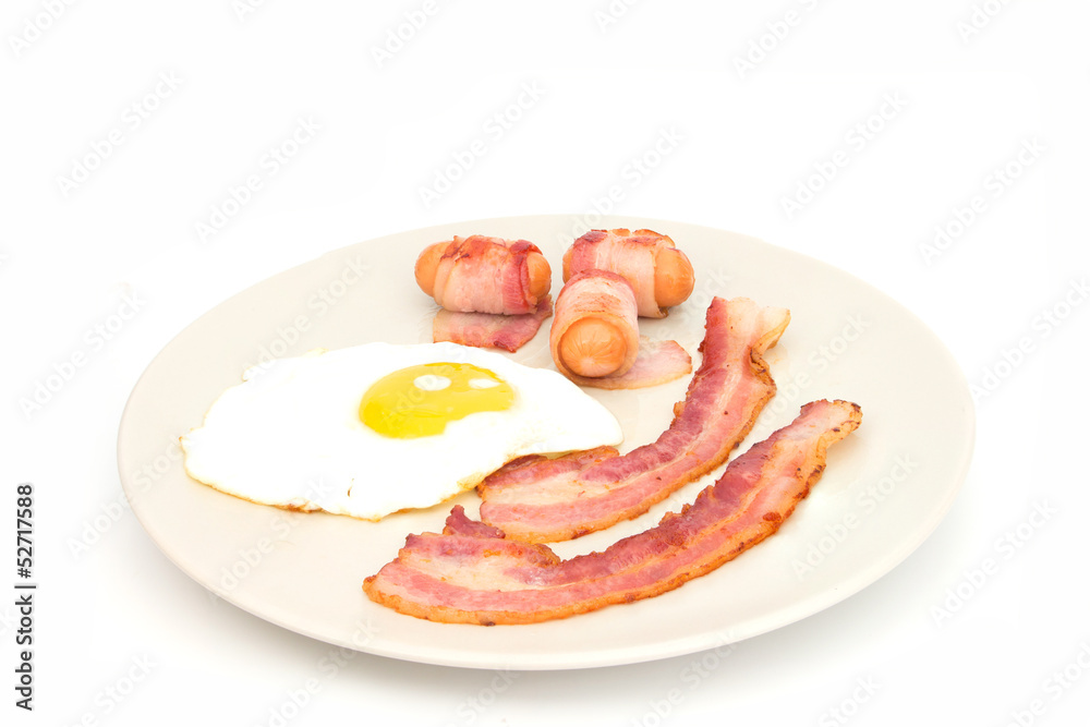 Bacon ham and egg  on dish isolated on white