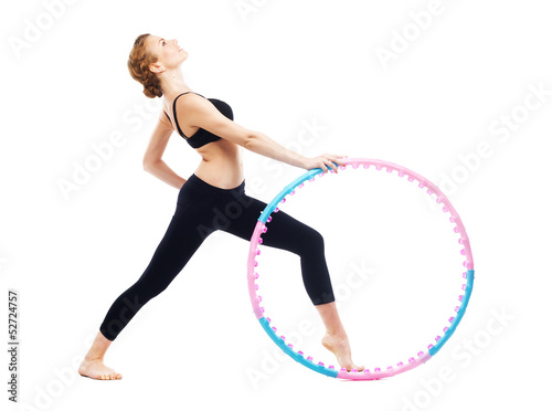 Beautiful sporty woman with hula hoop © Amelia Fox