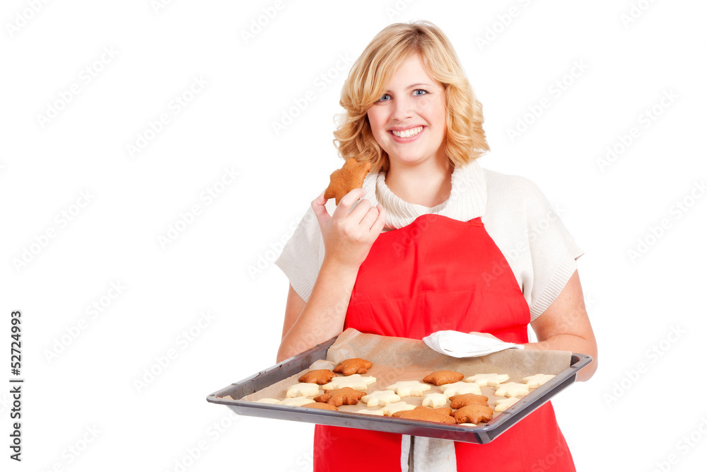 blond woman with red apron present christmas cookies