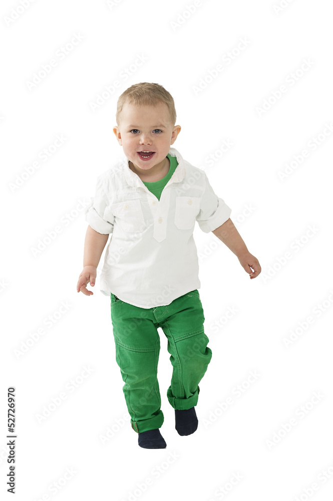 Handsome little boy approaching the camera Handsome little boy approaching the camera