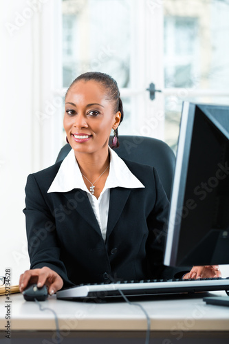 Lawyer in office sitting on the computer Free Download Lawyer in office sitting on the computer - GFXLoad