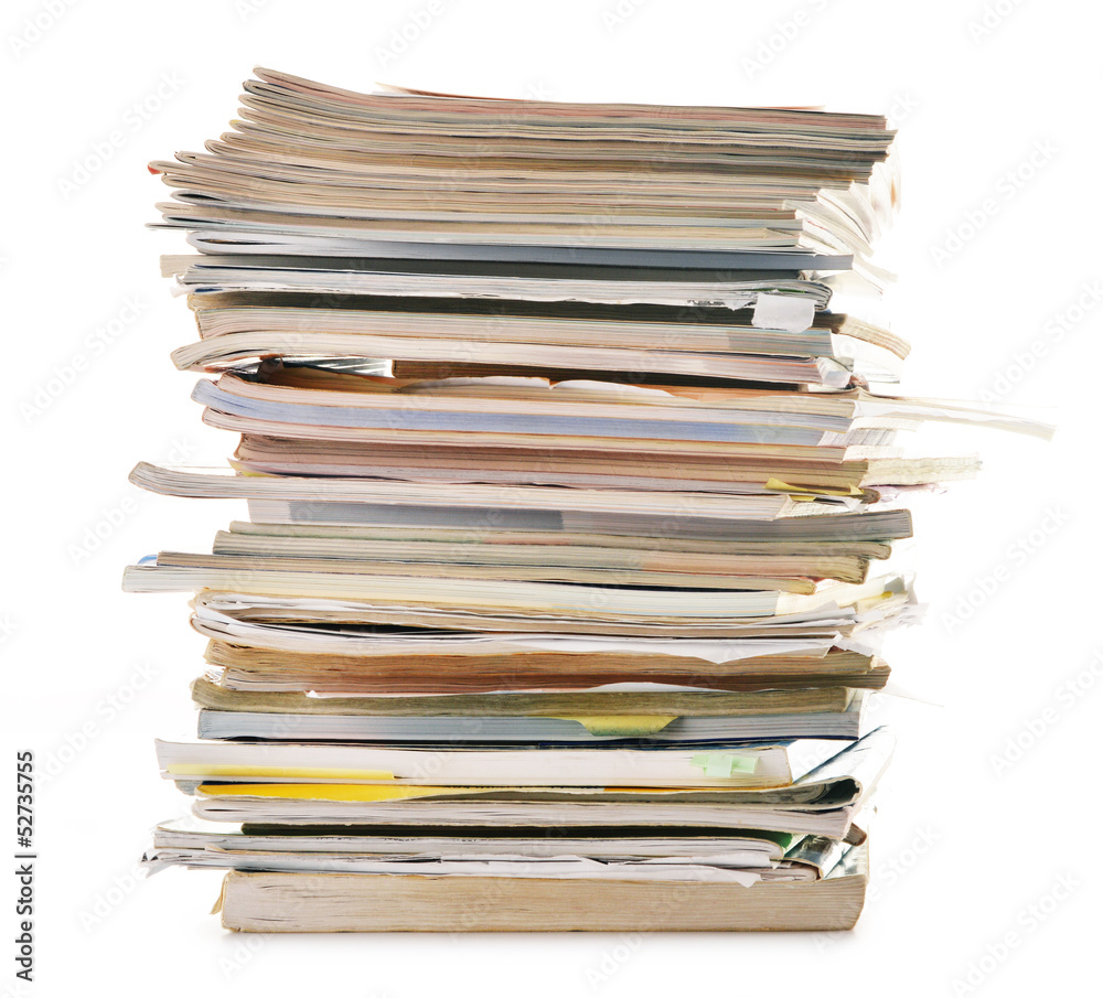 Stack of old magazines isolated on white. Paper recycling Stack of old magazines isolated on white. Paper recycling