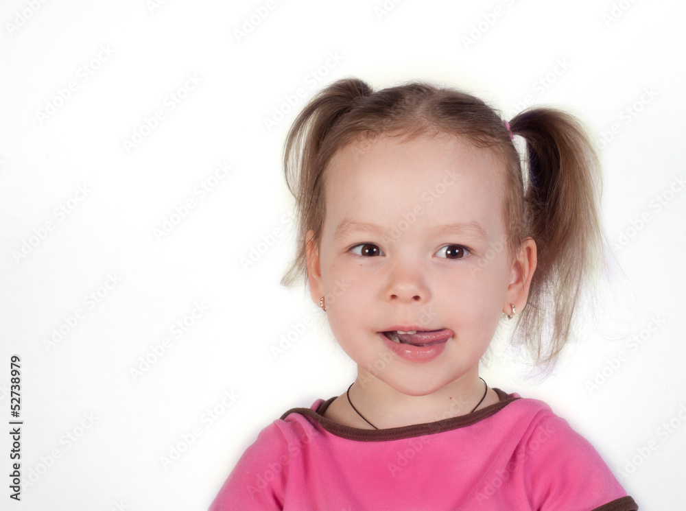 Cute little girl is licking her lips Cute little girl is licking her lips
