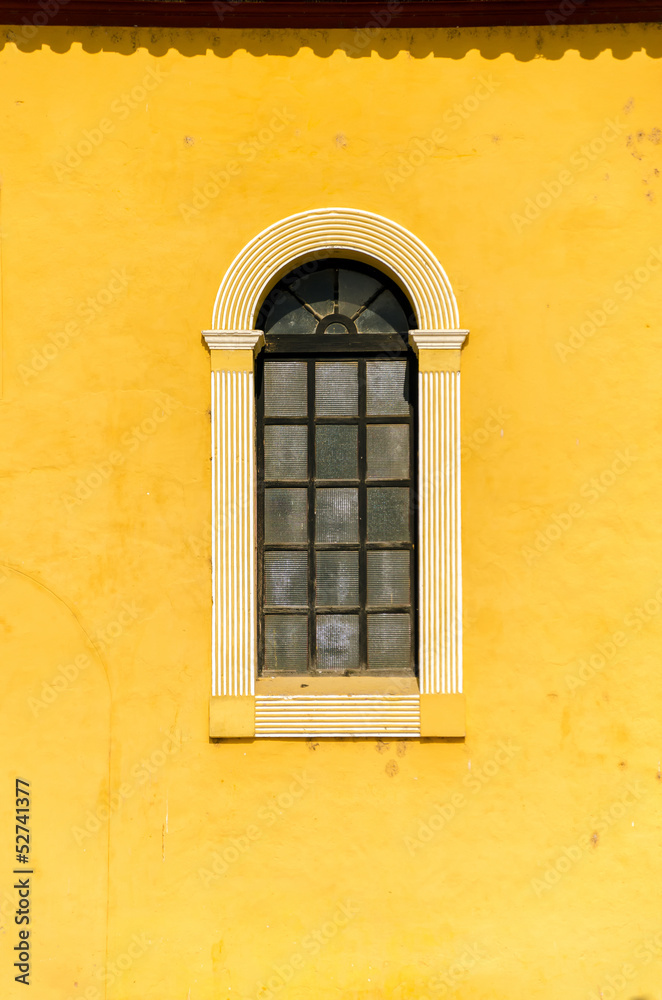 Window and Yellow Wall