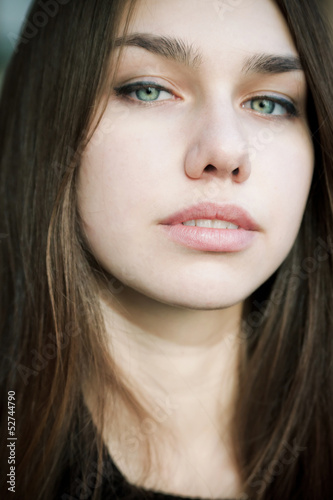 Portrait of a young woman with beautiful eyes. Soft focus.