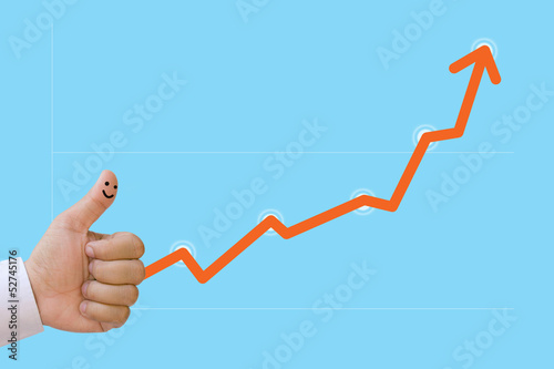 Business graph. The finger of the businessman.