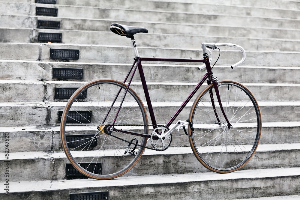City bicycle and concrete stairs, vintage style
