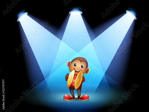 A monkey with cymbals at the stage