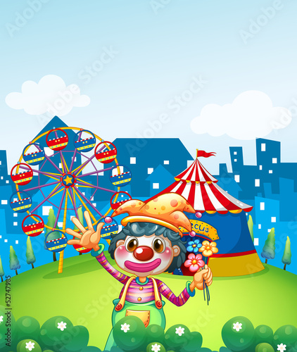 A female clown at the hill with flowers