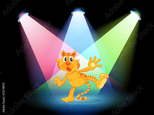 A tiger in the middle of the stage