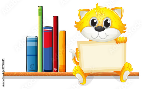 A cat holding an empty board above the wooden shelf with books