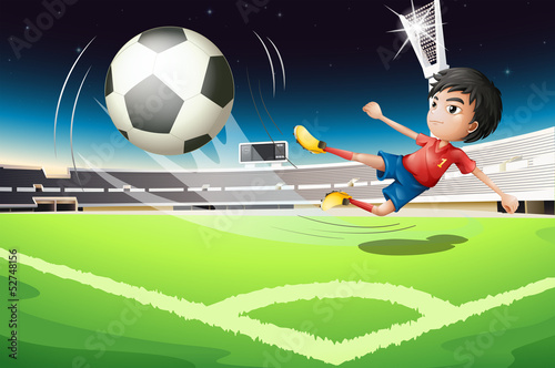 A football player kicking a ball