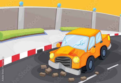 A cracked car at the road