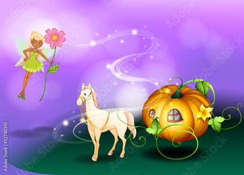 A fairy holding a flower with a pumpkin cart