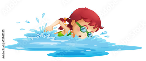 A young girl swimming in her green swimming attire