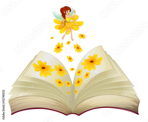 A book with a fairy and flowers
