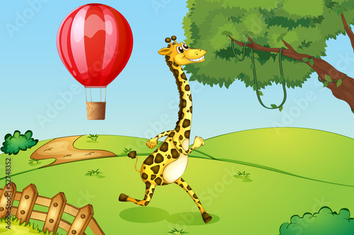 A giraffe running and a floating hot air balloon