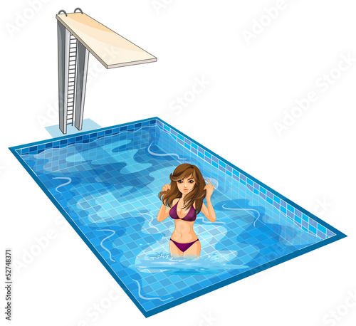 A girl with her violet bikini at the swimming pool