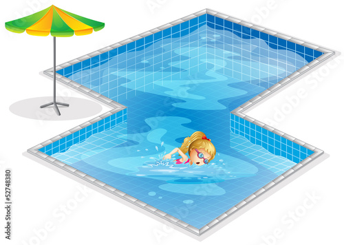 A girl swimming at the pool