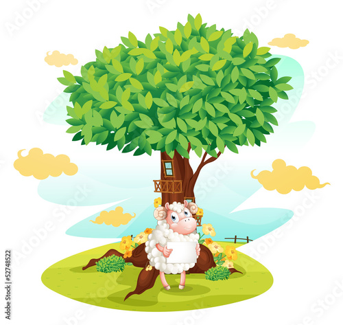A sheep holding an empty signboard beside a treehouse