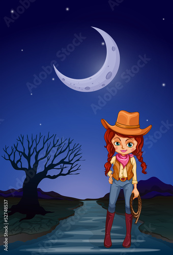 A cowgirl at the road in the middle of the night