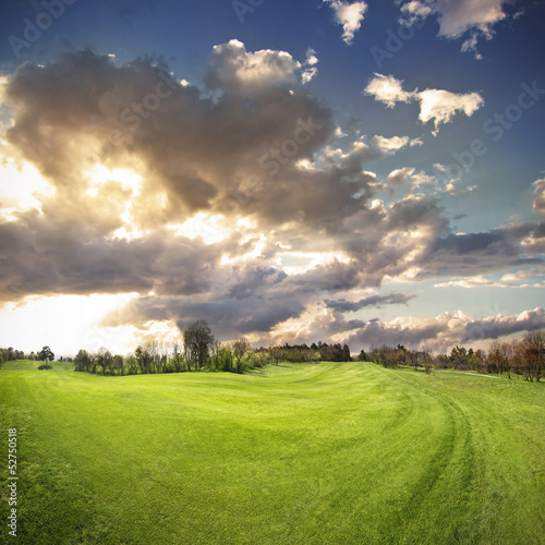 beautiful sunset on a golf field