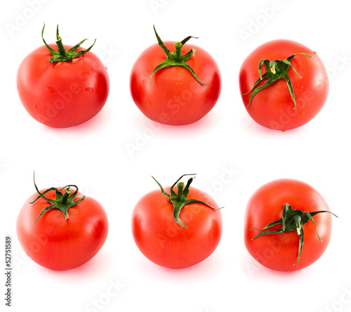 Six fresh tomatos covered with water drops isolated
