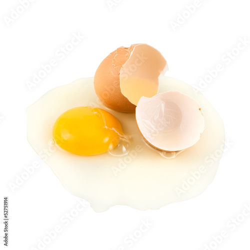 Cracked egg shell with yolk and protein