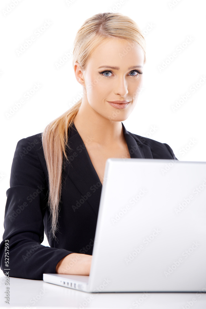 Cute blond business woman working on laptop Cute blond business woman working on laptop
