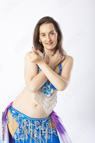 woman with curves dancing an oriental dance belly dancer