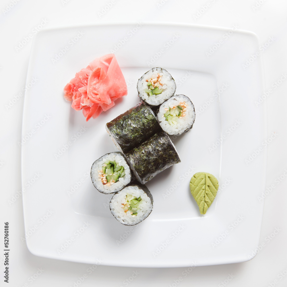 Maki Sushi on plate isolated on white Maki Sushi on plate isolated on white