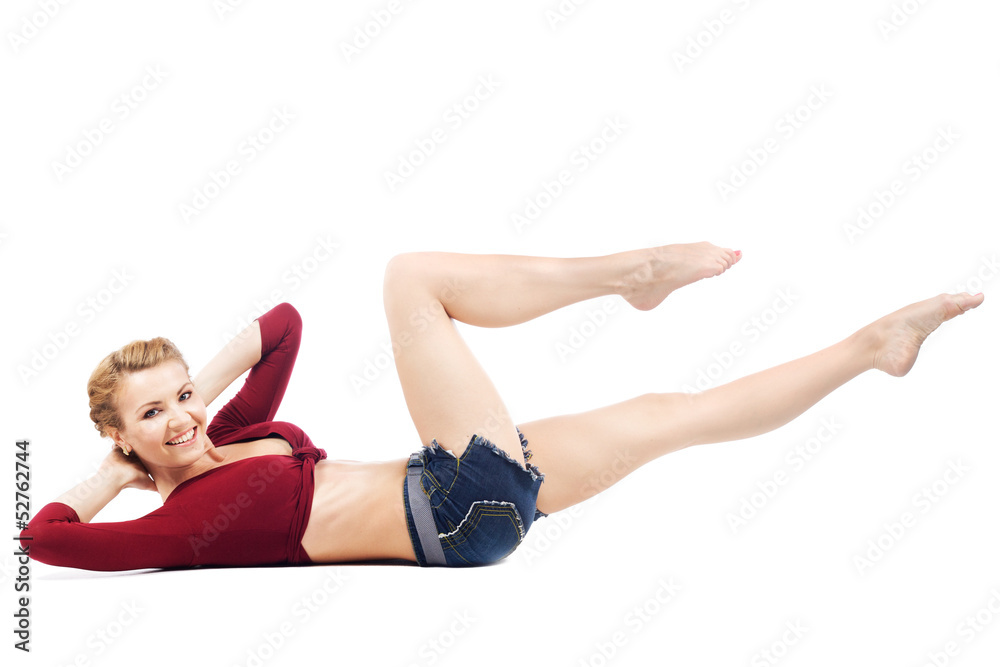 Beautiful sporty woman doing stretching exercise Beautiful sporty woman doing stretching exercise