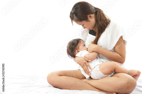 Mother is breast feeding for her baby