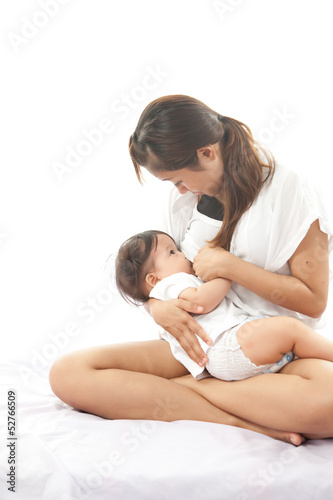 Mother is breast feeding for her baby