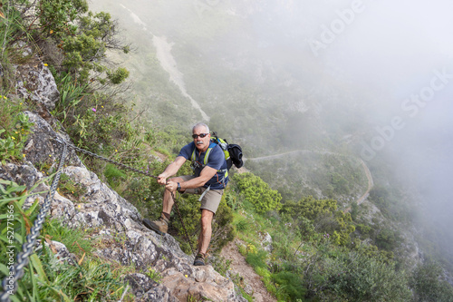 Man climbing on mountain