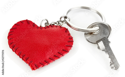 Fényképezés Key with leather trinket isolated on white