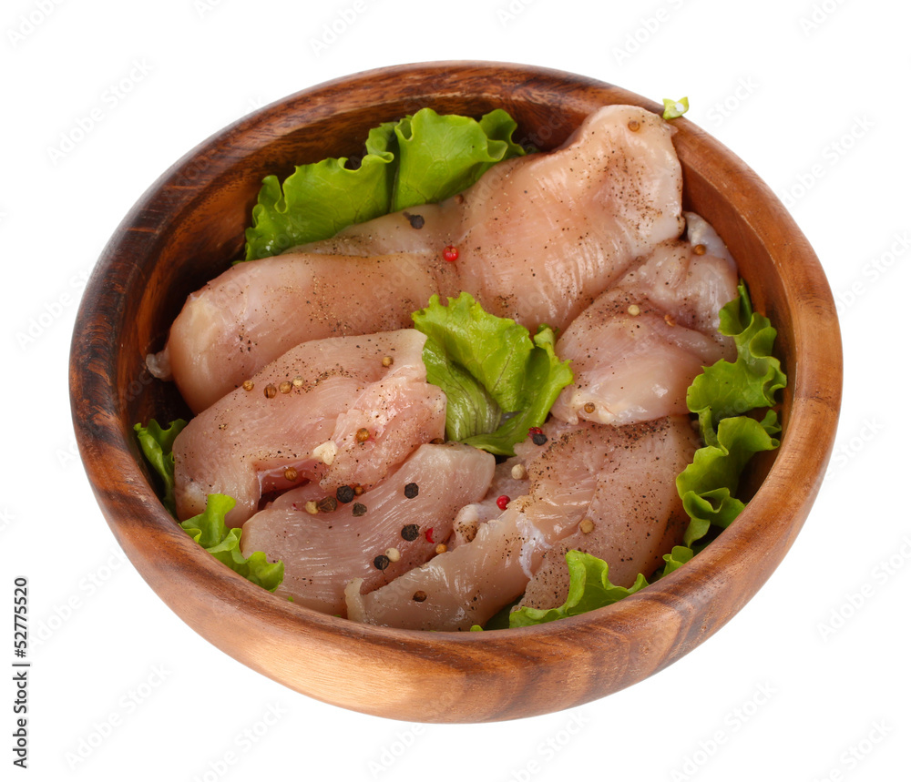 Chicken meat in wooden bowl isolated on white Chicken meat in wooden bowl isolated on white