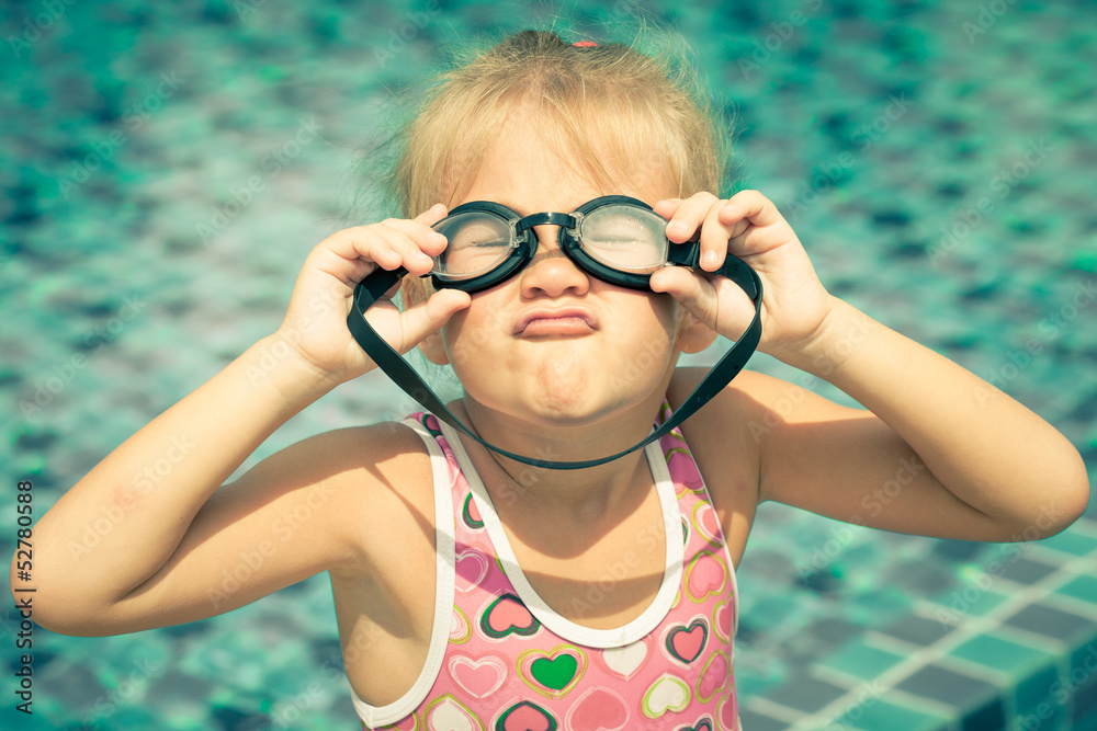 little girl in the swimming pool little girl in the swimming pool