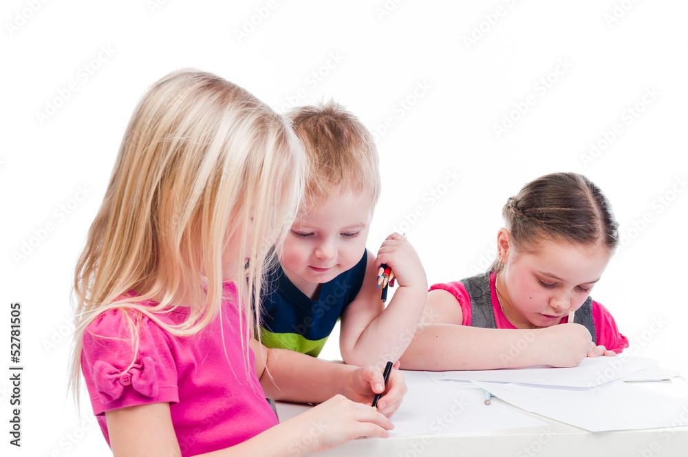 Small and beautiful children draw with pencils Small and beautiful children draw with pencils