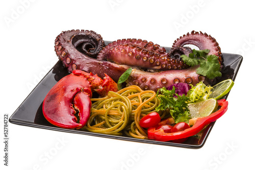 Fototapeta Naklejka Na Ścianę i Meble -  Seafood pasta with octopus and lobster leg