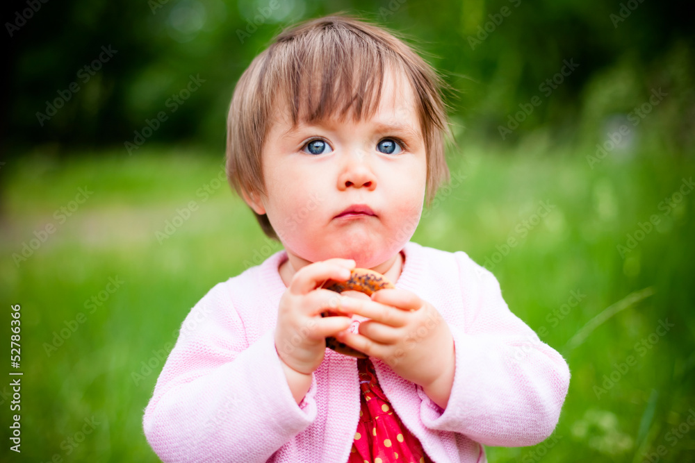 little girl eats bagel little girl eats bagel