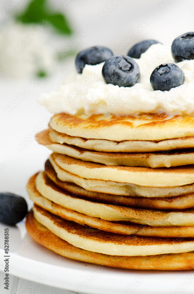 Small pancakes with blueberries, close up Small pancakes with blueberries, close up